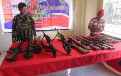 <p><strong>DATU HOFFER GUNS.</strong> Fifteen loose firearms surrendered by local officials of Datu Hoffer, Maguindanao, during a simple ceremony held Thursday (April 12) at the town’s municipal hall. <em><strong>(Photo by 6ID)</strong></em></p>